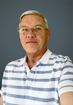 Picture of man with glasses.