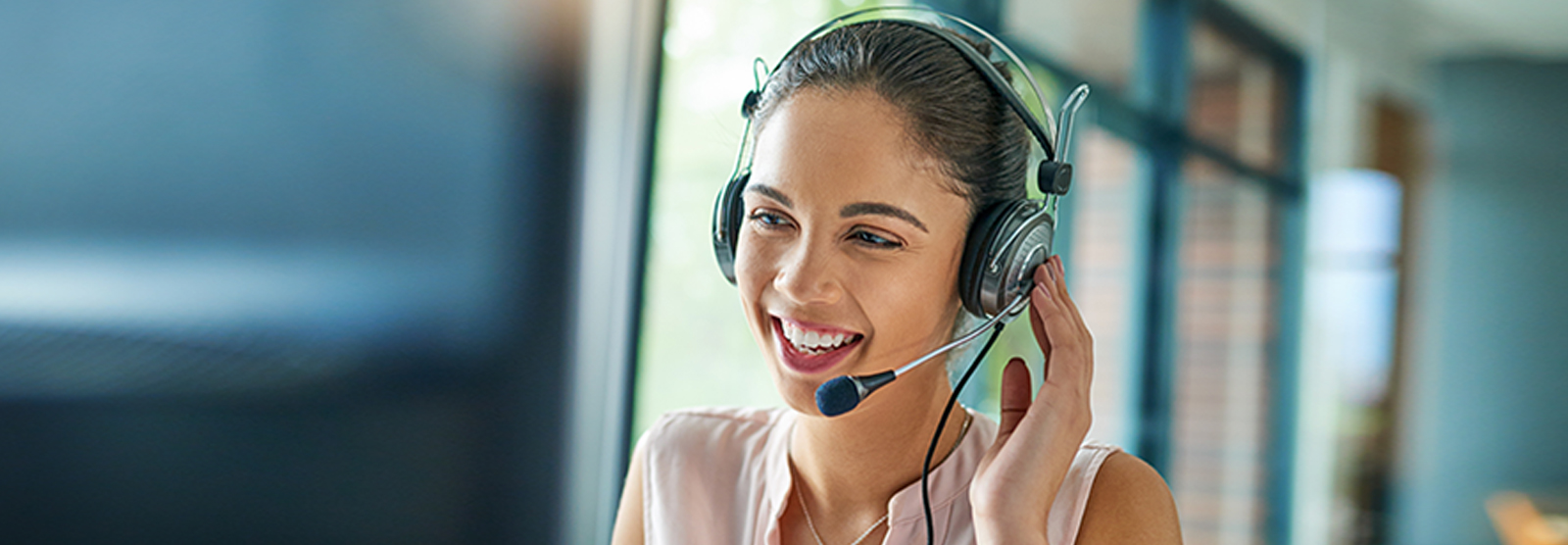 Personal teller operator with headset.