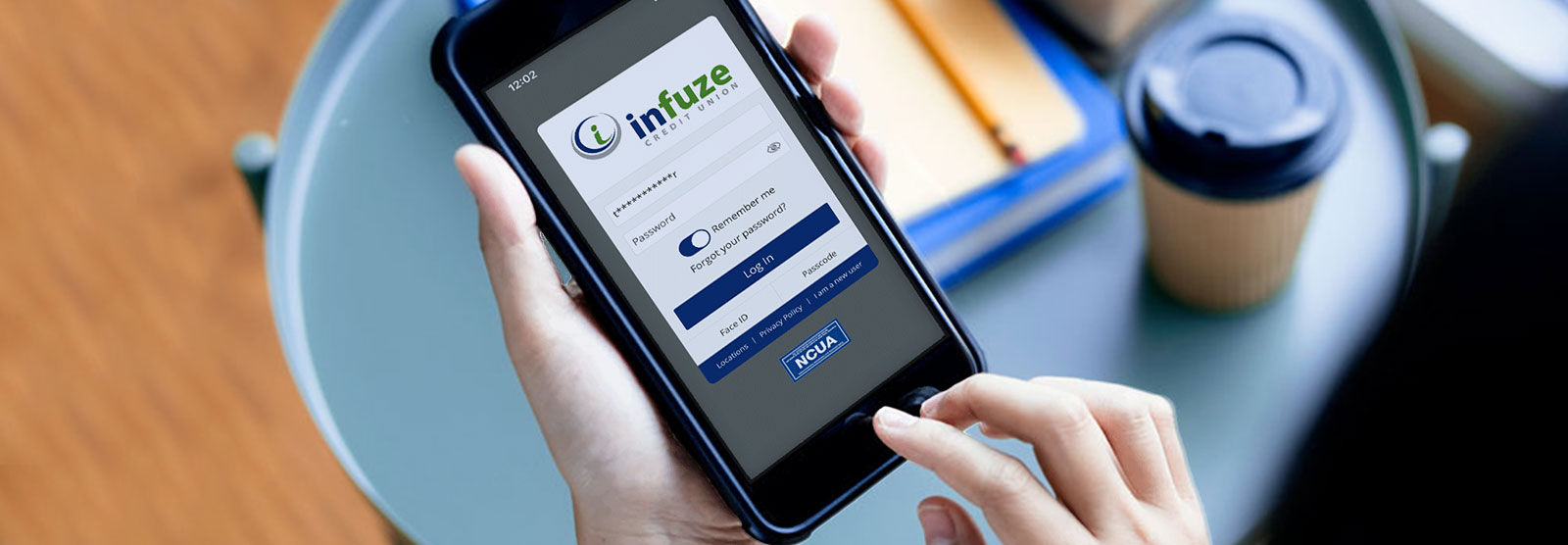person looking on their phone at Infuze Credit Union online banking