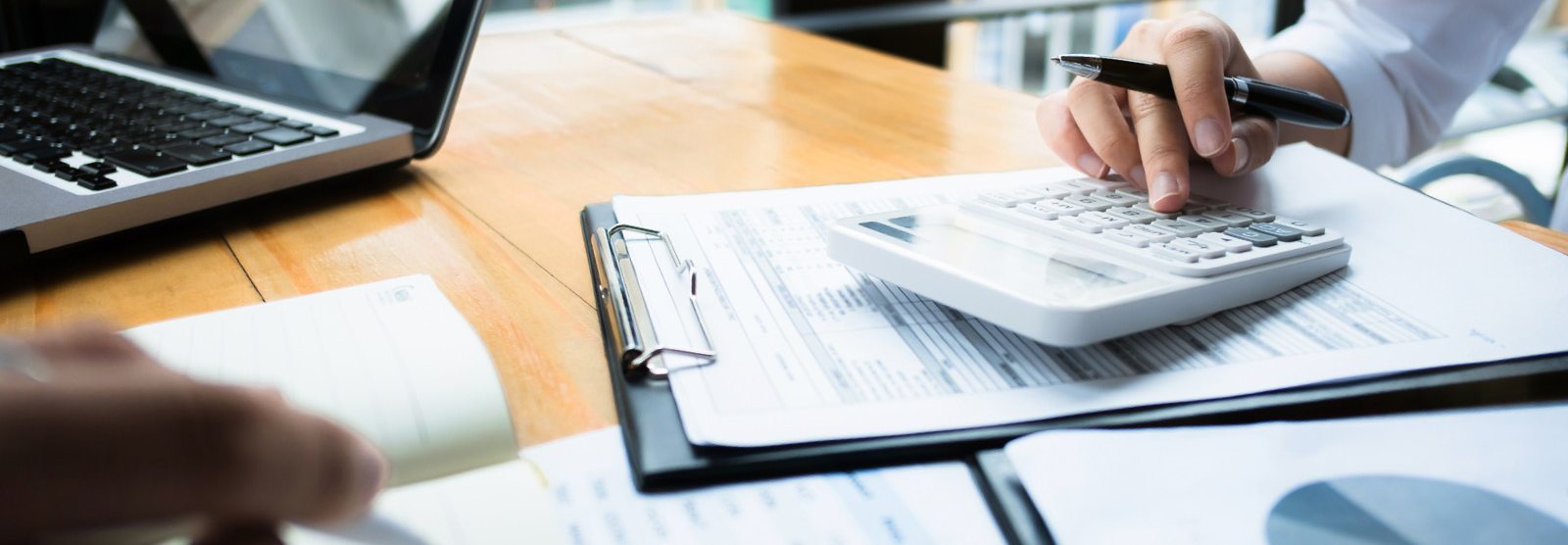 two people working on their finances